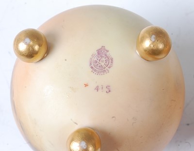 Lot 2047 - A Royal Worcester globular vase, on three...