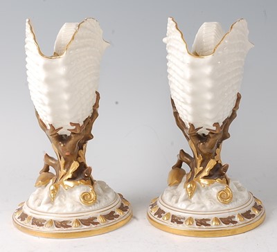 Lot 2051 - A pair of Royal Worcester porcelain Nautilus...