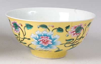 Lot 2366 - A Chinese porcelain yellow ground bowl, enamel...