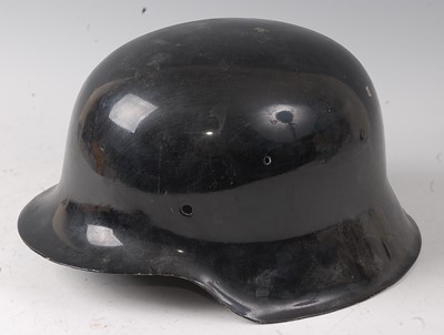 Lot 169 - A German Model 1935 steel helmet, having later...