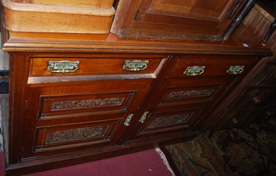 Lot 1286 - A late Victorian walnut sideboard, with carved...