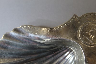 Lot 2126 - A set of three George III silver shell shaped...