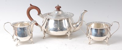 Lot 2135 - A George V silver three-piece tea set,...