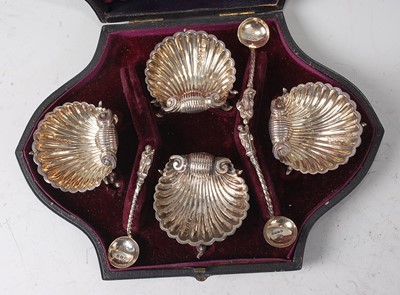 Lot 2140 - A late Victorian cased set of four silver...