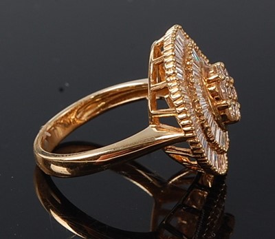 Lot 2235 - An 18ct gold diamond set suite of jewellery,...
