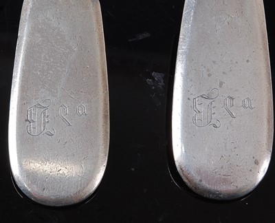 Lot 2150 - A pair of Russian silver tablespoons, each in...