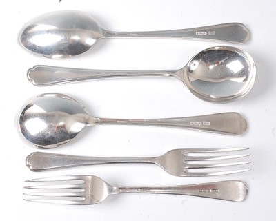 Lot 2154 - A set of four silver soup spoons, maker Walker...