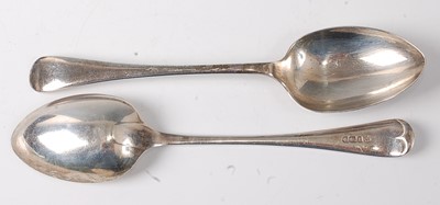 Lot 2163 - A set of eight George V silver tablespoons, in...