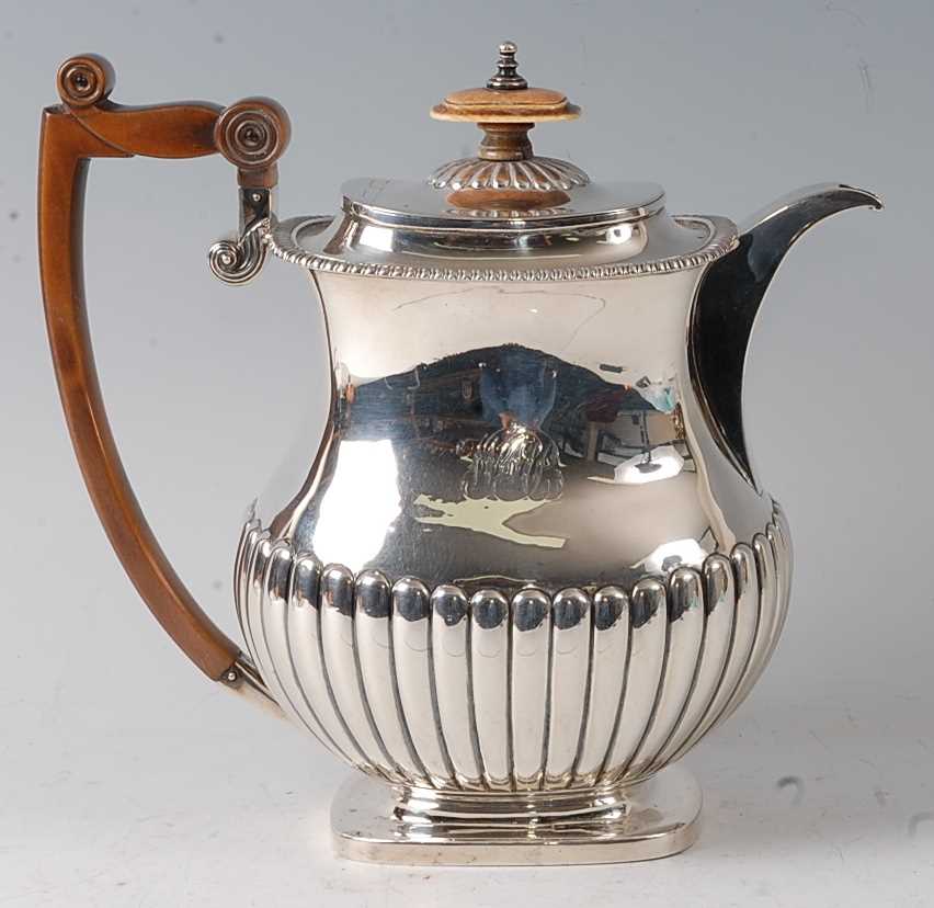 Lot 2169 - A Regency period silver coffee pot, having...