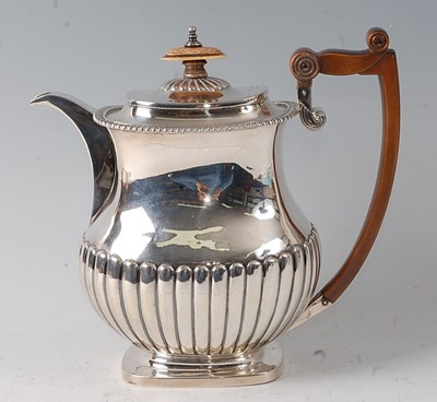Lot 2169 - A Regency period silver coffee pot, having...