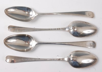 Lot 2189 - A set of four George III silver dessert spoons,...