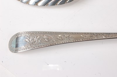 Lot 2192 - A pair of George III silver serving spoons, in...