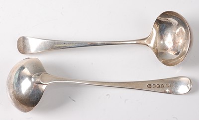 Lot 2195 - A pair of George III silver sauce ladles, in...