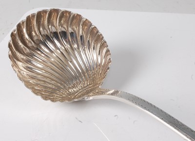 Lot 2196 - A George III silver soup ladle, in the Old...