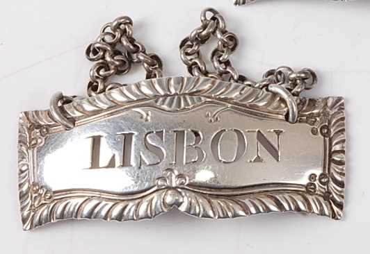 Lot 2181 - A George III silver decanter label for Lisbon,...