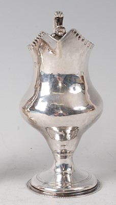 Lot 2177 - A George III silver pedestal cream jug, of...