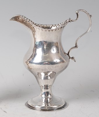 Lot 2177 - A George III silver pedestal cream jug, of...