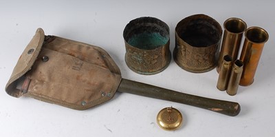 Lot 184 - A pair of WW I trench art shell cases with...