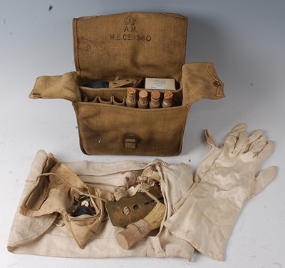 Lot 186 - A WW II Air Ministry first aid kit in webbing...