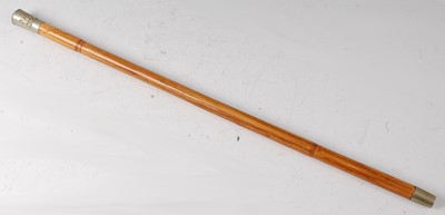 Lot 49 - A military swagger stick, having a bamboo...