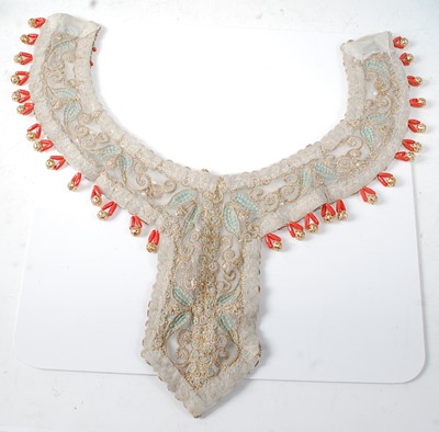 Lot 2250 - An early 20th century embroidered beadwork...