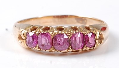 Lot 2505 - A late Victorian yellow metal ruby five-stone...