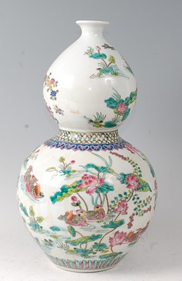 Lot 2368 - A Chinese famille rose porcelain double gourd...