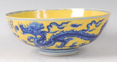 Lot 2367 - A Chinese porcelain yellow ground 'dragon'...