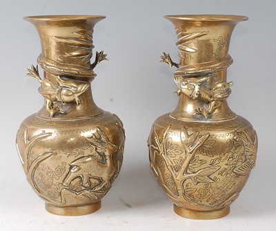 Lot 2359 - A pair of Chinese gilt bronze vases, the...