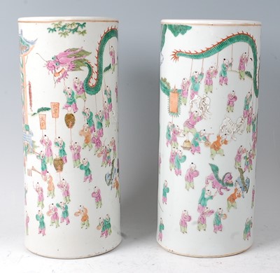 Lot 36 - A pair of Chinese famille rose cylindrical...