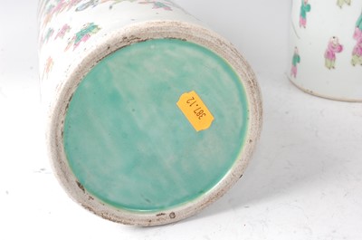 Lot 36 - A pair of Chinese famille rose cylindrical...