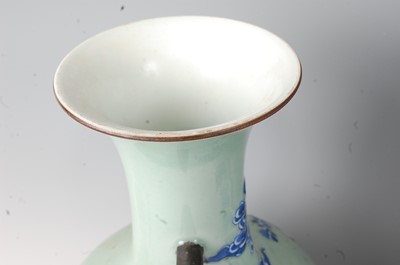 Lot 45 - A Chinese export celadon ground baluster vase,...