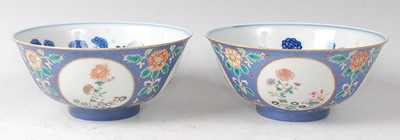 Lot 2378 - A pair of Chinese porcelain powder-blue ground...