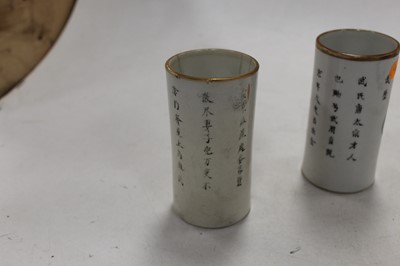 Lot 280 - A pair of Chinese Famille Rose cylinder poetry...