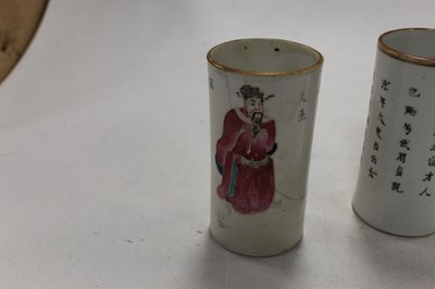 Lot 280 - A pair of Chinese Famille Rose cylinder poetry...