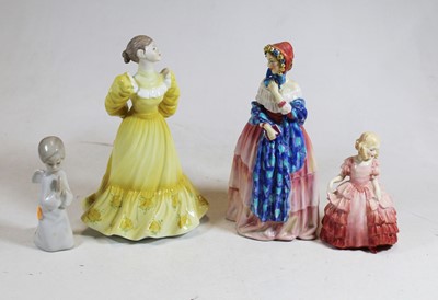Lot 281 - A collection of four various porcelain figures...