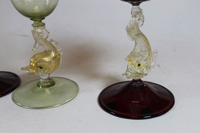 Lot 271 - A pair of Venetian cranberry glass...