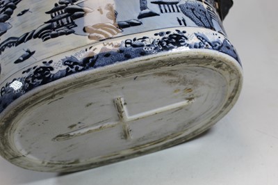 Lot 177 - A blue and white stoneware footbath, decorated...