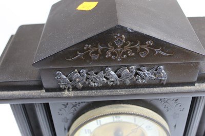 Lot 105 - A Victorian black slate mantel clock of...