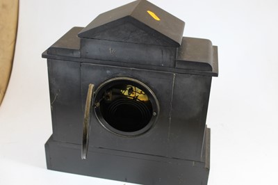 Lot 105 - A Victorian black slate mantel clock of...