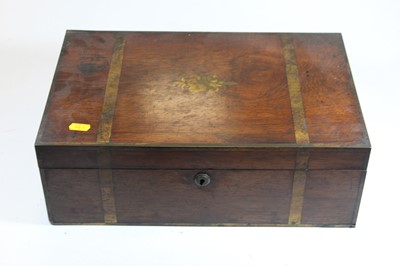 Lot 178 - A Victorian rosewood and brass inlaid writing...