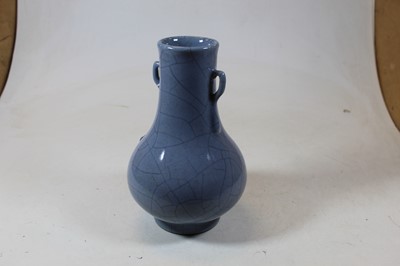 Lot 186 - A Chinese crackle glaze vase on blue ground...