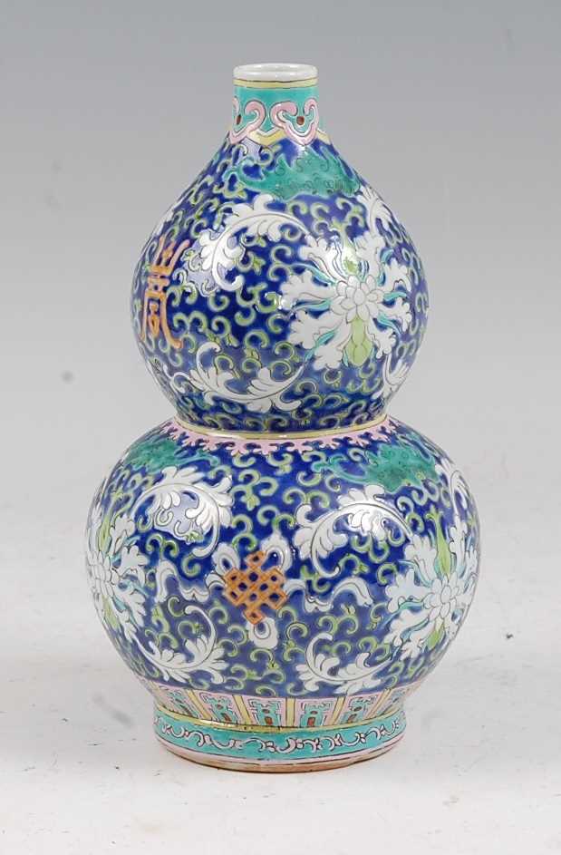 Lot 9 - A Chinese export vase of double gourd form,...