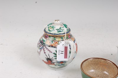 Lot 31 - A Chinese export tea bowl on green ground with...