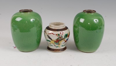 Lot 34 - A pair of Chinese green crackle glazed vases...