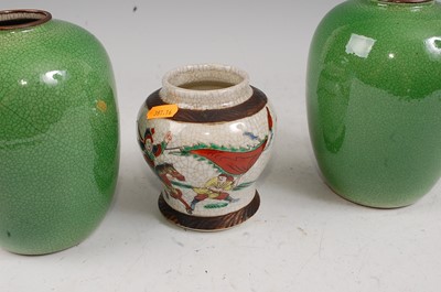 Lot 34 - A pair of Chinese green crackle glazed vases...