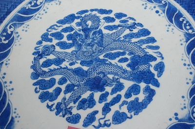 Lot 48 - A large Chinese stoneware blue & white charger...