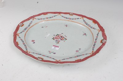 Lot 47 - A stoneware meat dish of shaped oval form,...