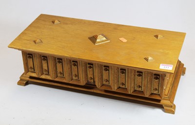 Lot 153 - A German oak puzzle box in the form of a...