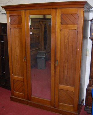 Lot 1112 - A late Victorian walnut wardrobe, the central...